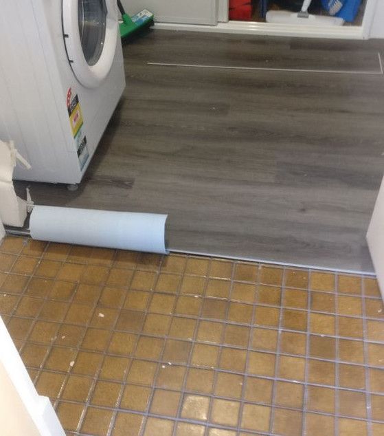 vinyl_flooring_over_laundry-tiles.jpg