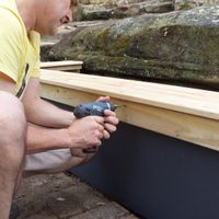 Step 11 Fit decking beneath capping.jpg