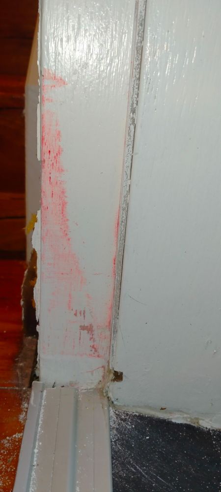 Red paint from door when jamming.
