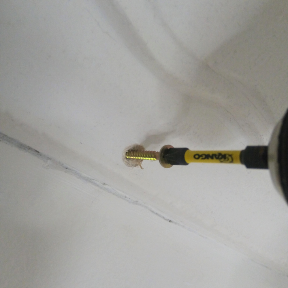 4.3 Screwing through cornice in wall sheet.png