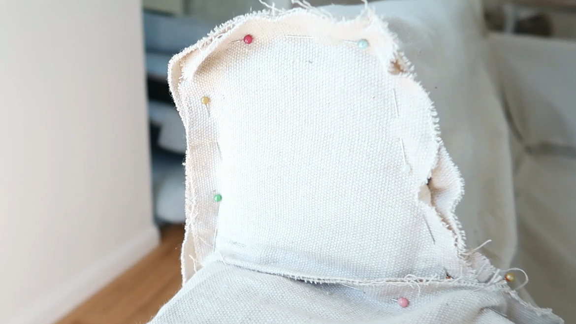 I pinned the pieces in place on the sofa before sewing them together.