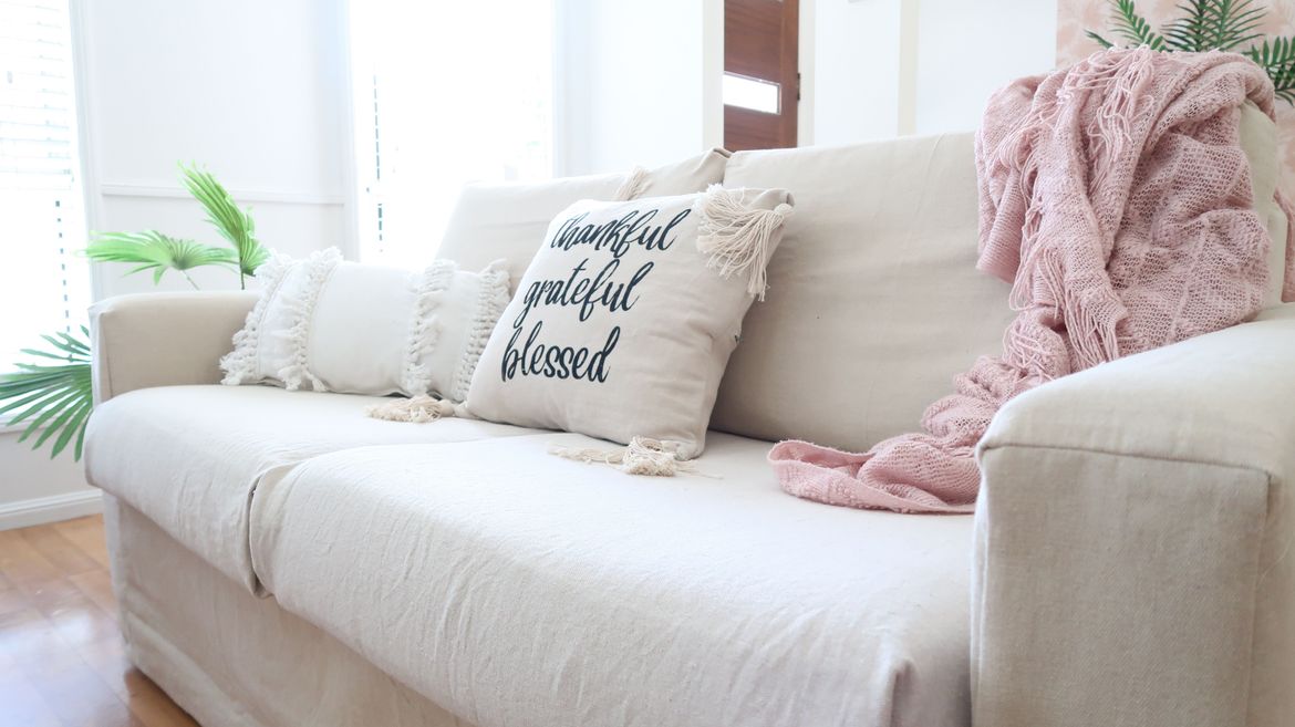 Now we have an updated, modern and practical sofa that we just love. Now to cover the other one...oh boy!