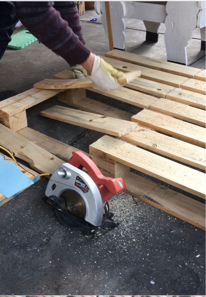 Lifting the slats up that will form the front and back.