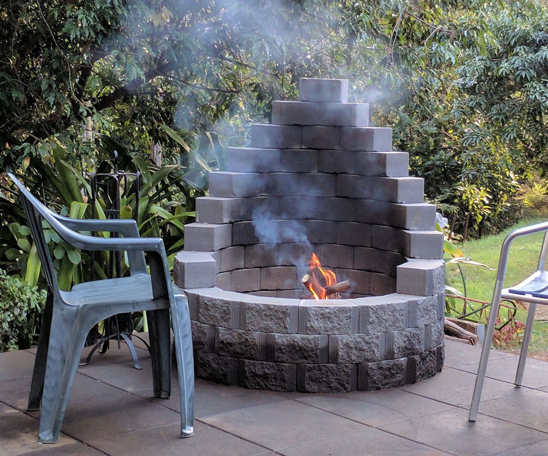 Backyard fire pit with bench seating Bunnings community