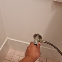 1.4 Turn off cistern tap clockwise.png