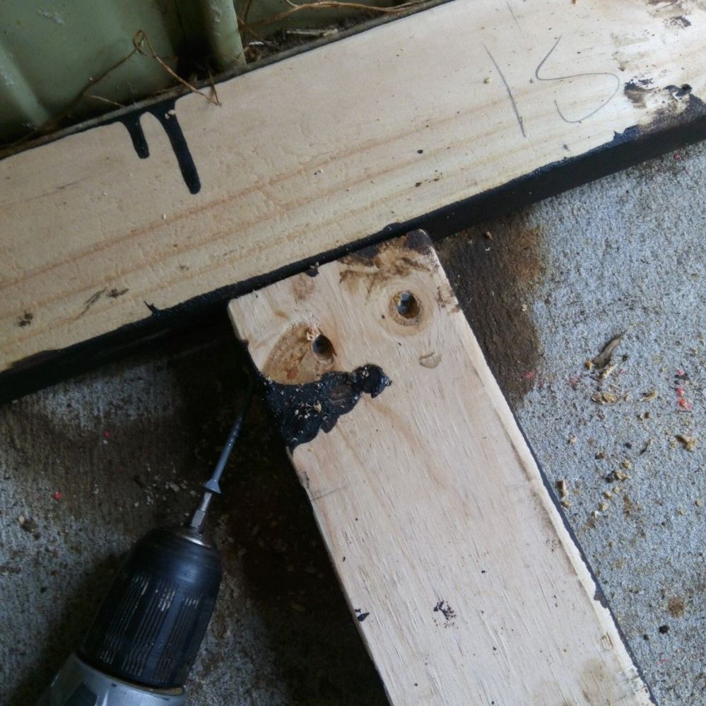 5.3 Fixing timber joists to frame.jpg