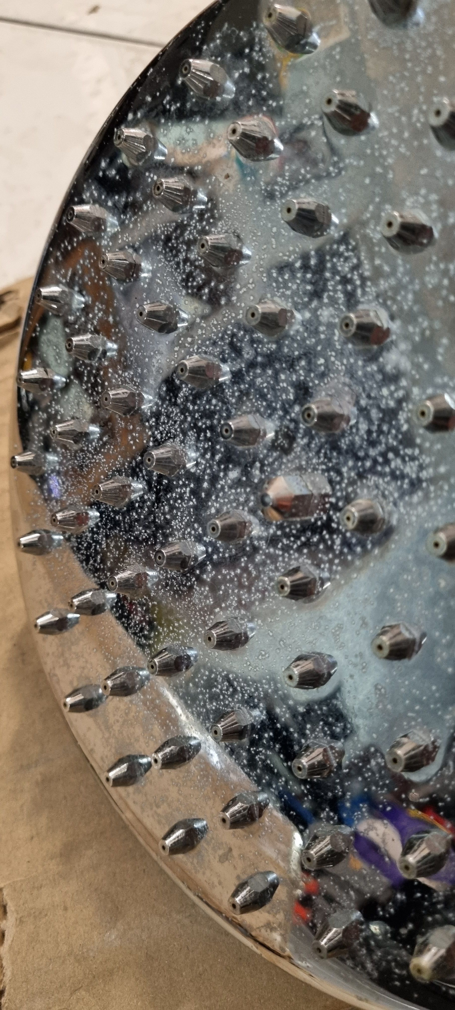 How to remove water scale from shower he... Bunnings community