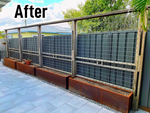 Recycled hardwood and trellis fence with planter boxes