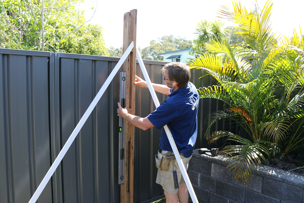 Recycled hardwood and trellis fence with... Bunnings community