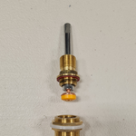 Step 5.6 Insert new tap valve at bottom of spindle and line up with tap base.png