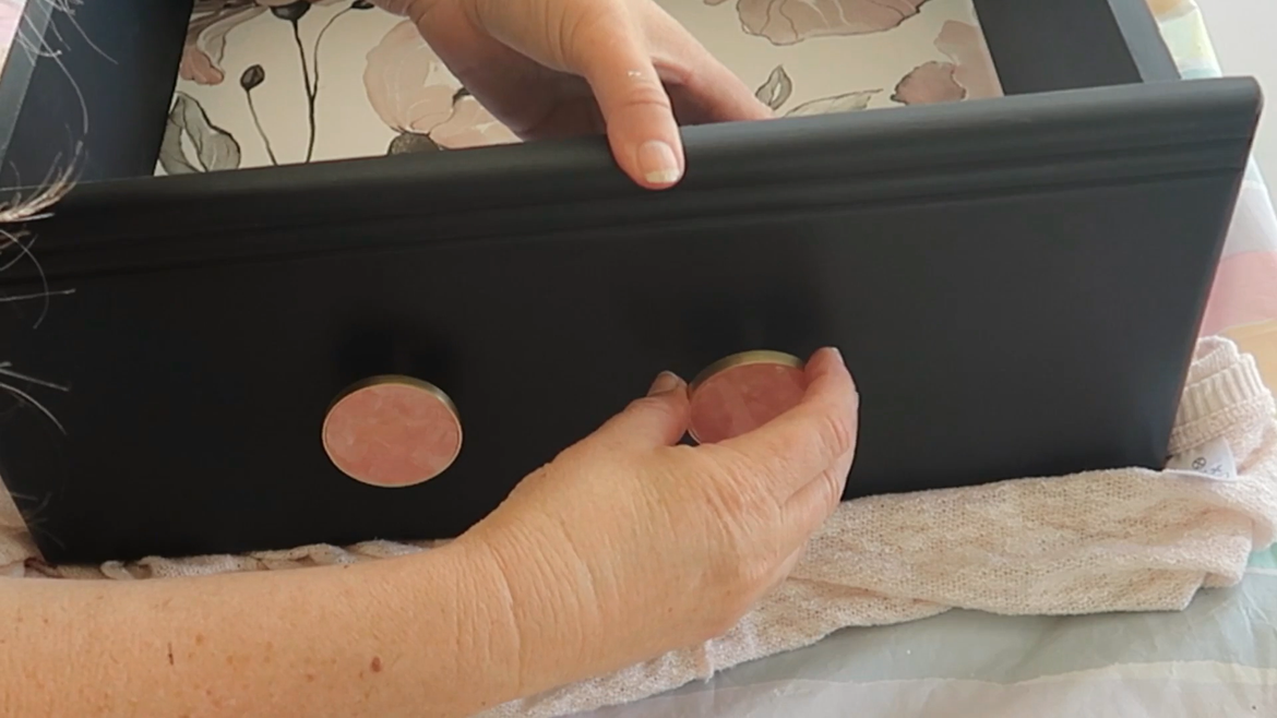 Kmart had their drawer knobs reduced so again I was able to pick up a bargain. These were $2 a packet so $1 each knob. As I hadn't filled in the holes because I thought I was going to replace the old knobs - I changed my mind - I decided to put a single knob in each hole. I thought it was an original touch.