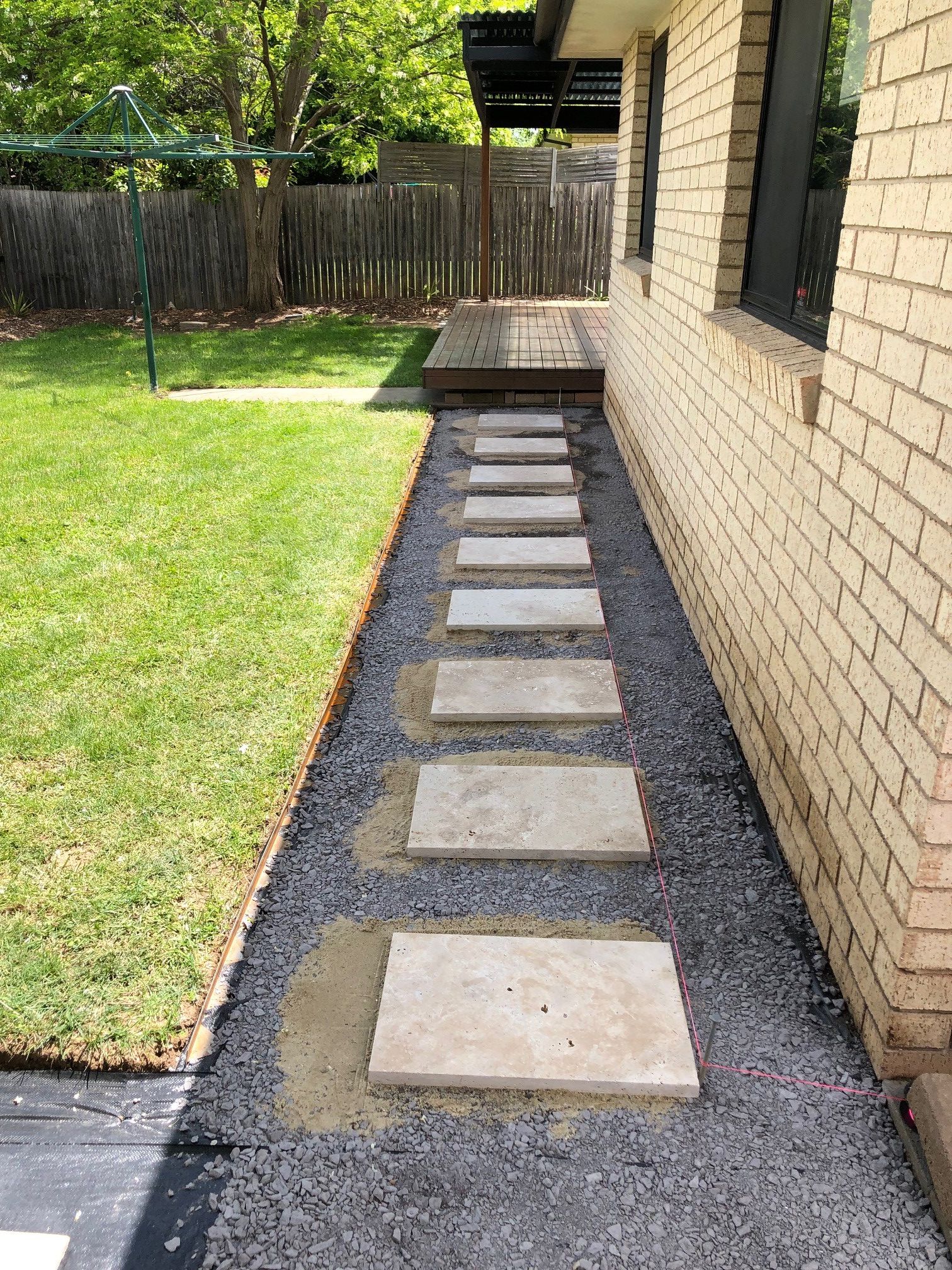 Travertine pavers and gravel garden path Bunnings community