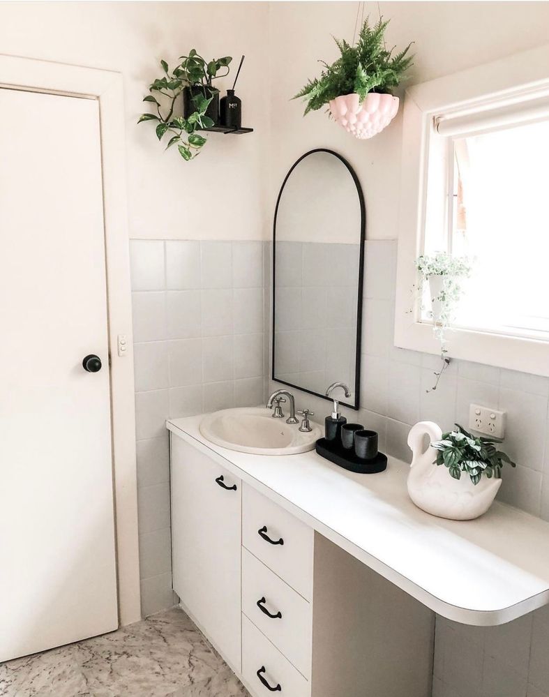 I used the Dulux Renovation paint, Winton Self-stick Tiles and new handles to makeover my old bathroom.