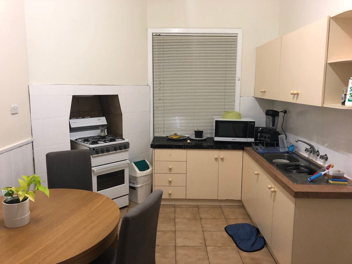 Kitchen. Not much working space. Note I have already whipped out the white knight tile paint v front of stove area and splashback
