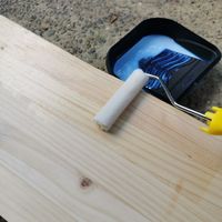 3.1 Applying varnish to underside of tabletop.jpg