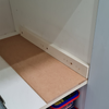 5.1 Attach timber spacer to cabinet wall.png