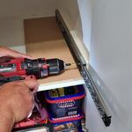 5.3 Screw drawer runner to cabinet.png