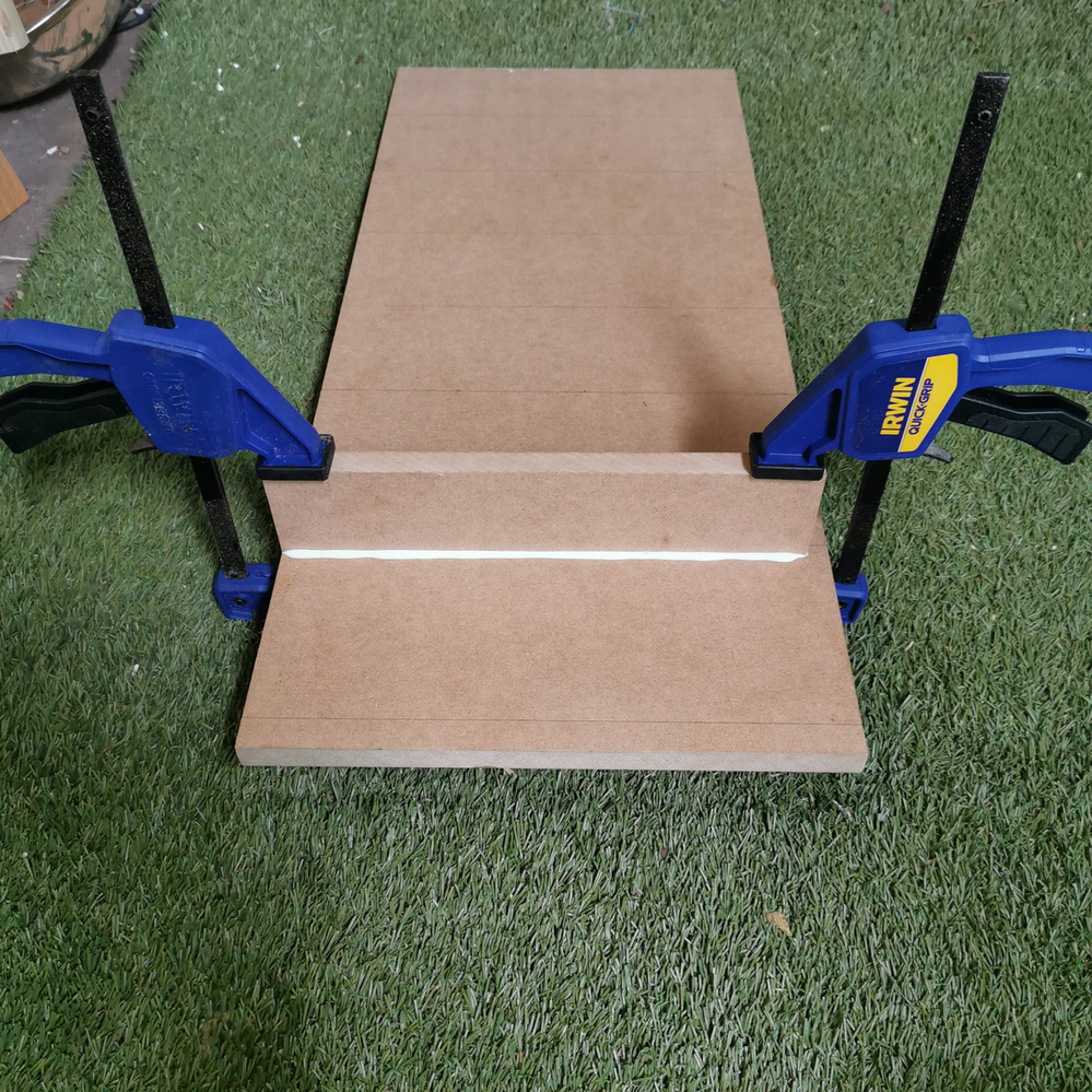 4.4 Clamping first rail piece in position.png