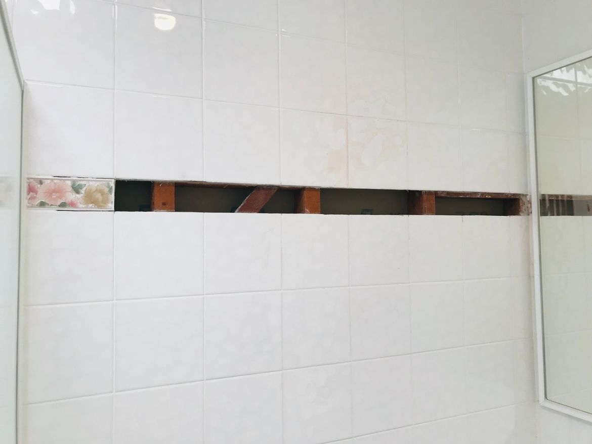 Tiles gone, but so is the wall.