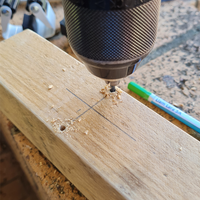 3.3 Drill pilot holes for broom holder hooks.png