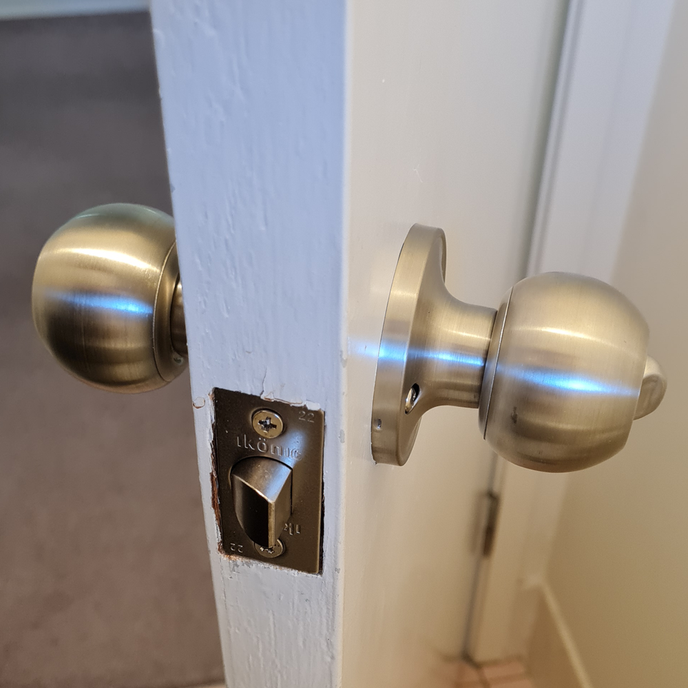 Step 5.5 New door knob installed.png