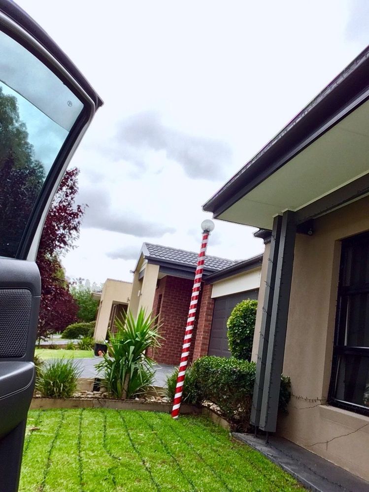 Nth Pole,Home made,supplies>Bunnings 90mm pvc pipe, red (rustolium brand spray paint adheres to plastic,white cloth gaffa tape,1 light fitting Simple