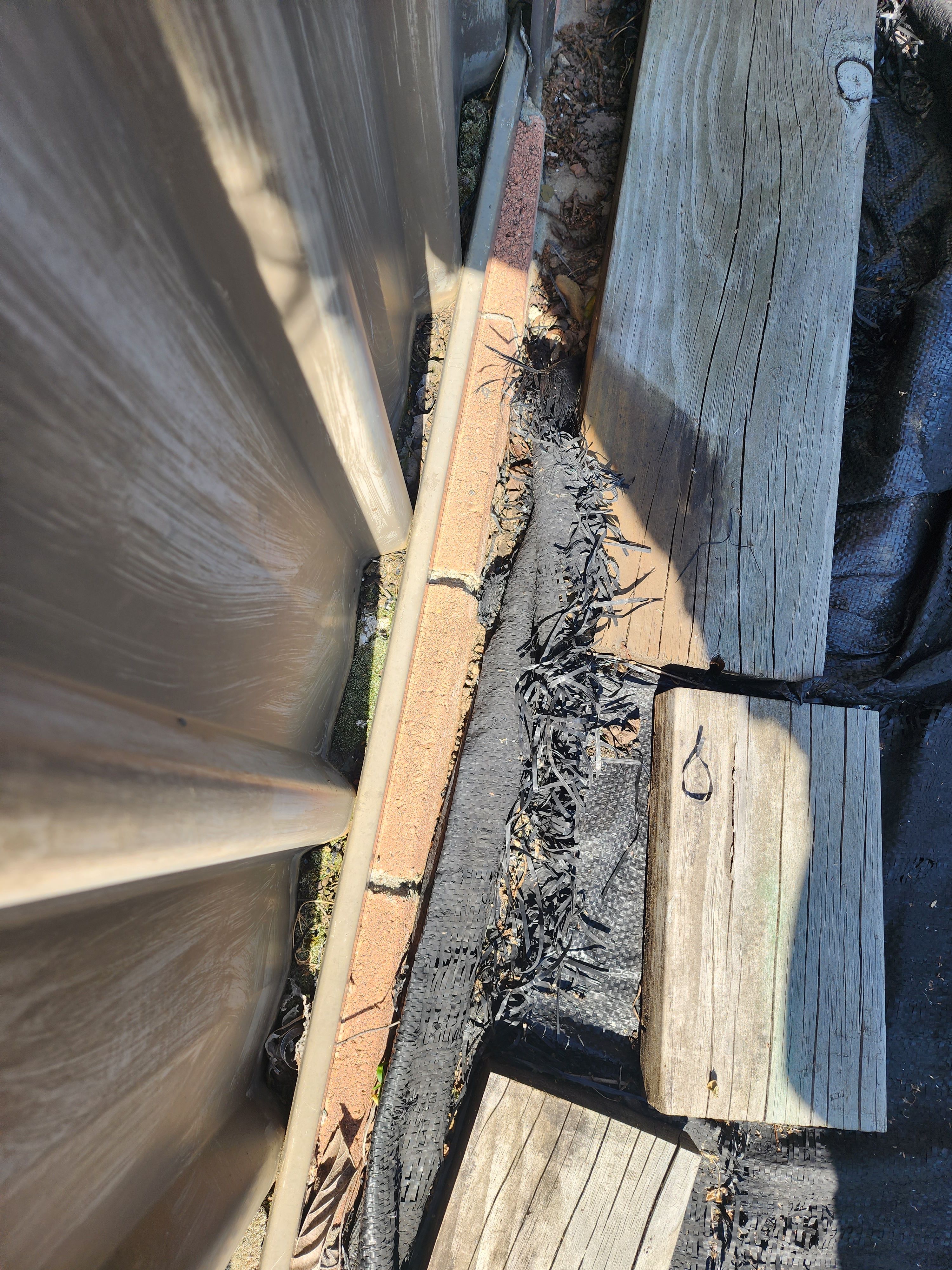 How to fill gap under Colorbond fence? Bunnings community