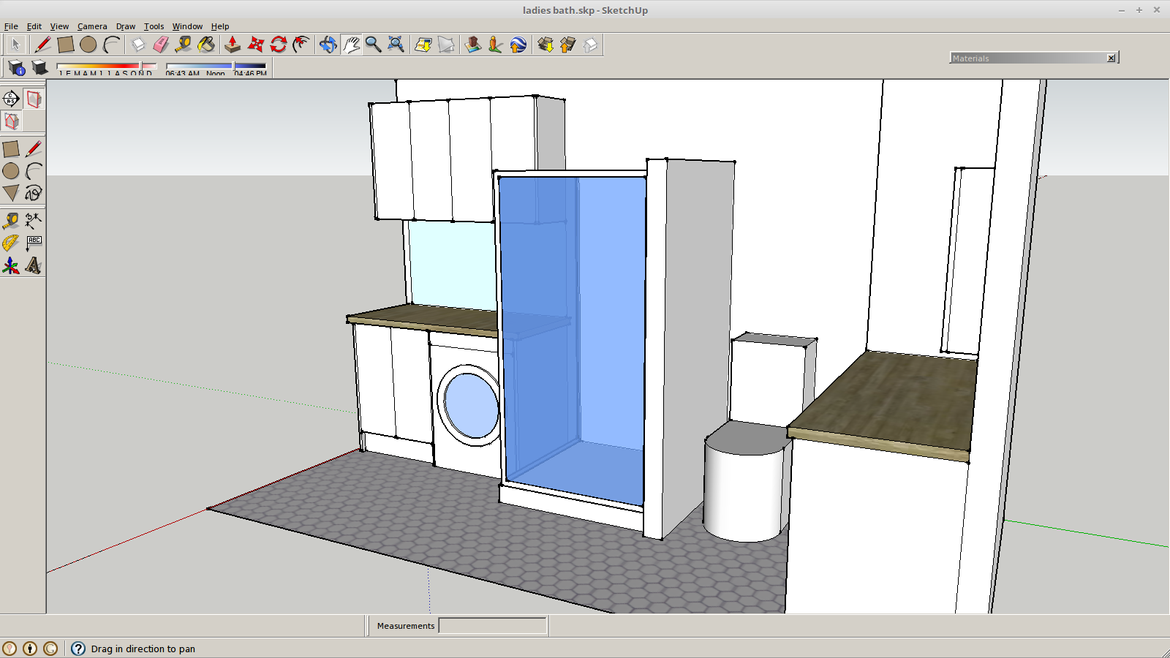 The shower wall need not be so high. It allows ambient light to pass at the top.