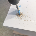 2.3 Drilling hole for leg bolt.png