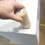 2.6 Screwing leg onto plate.png