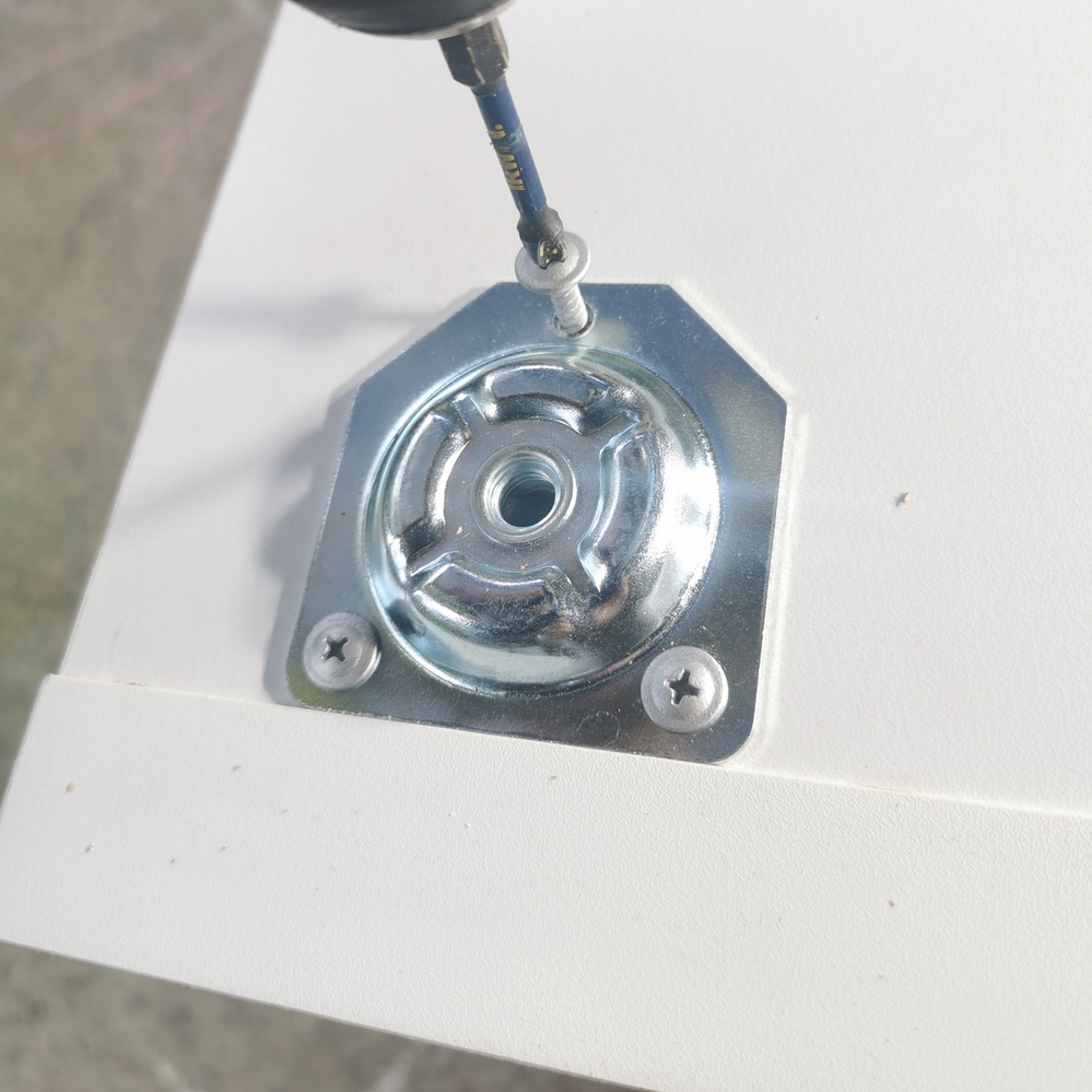 2.5 Attaching leg plate to storage unit.png