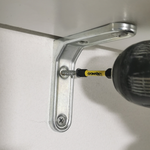 5.2 Attaching bracket to wall.png