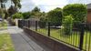 Tubular fence extension and double gate