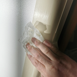 5.1 Wiping down architrave.png