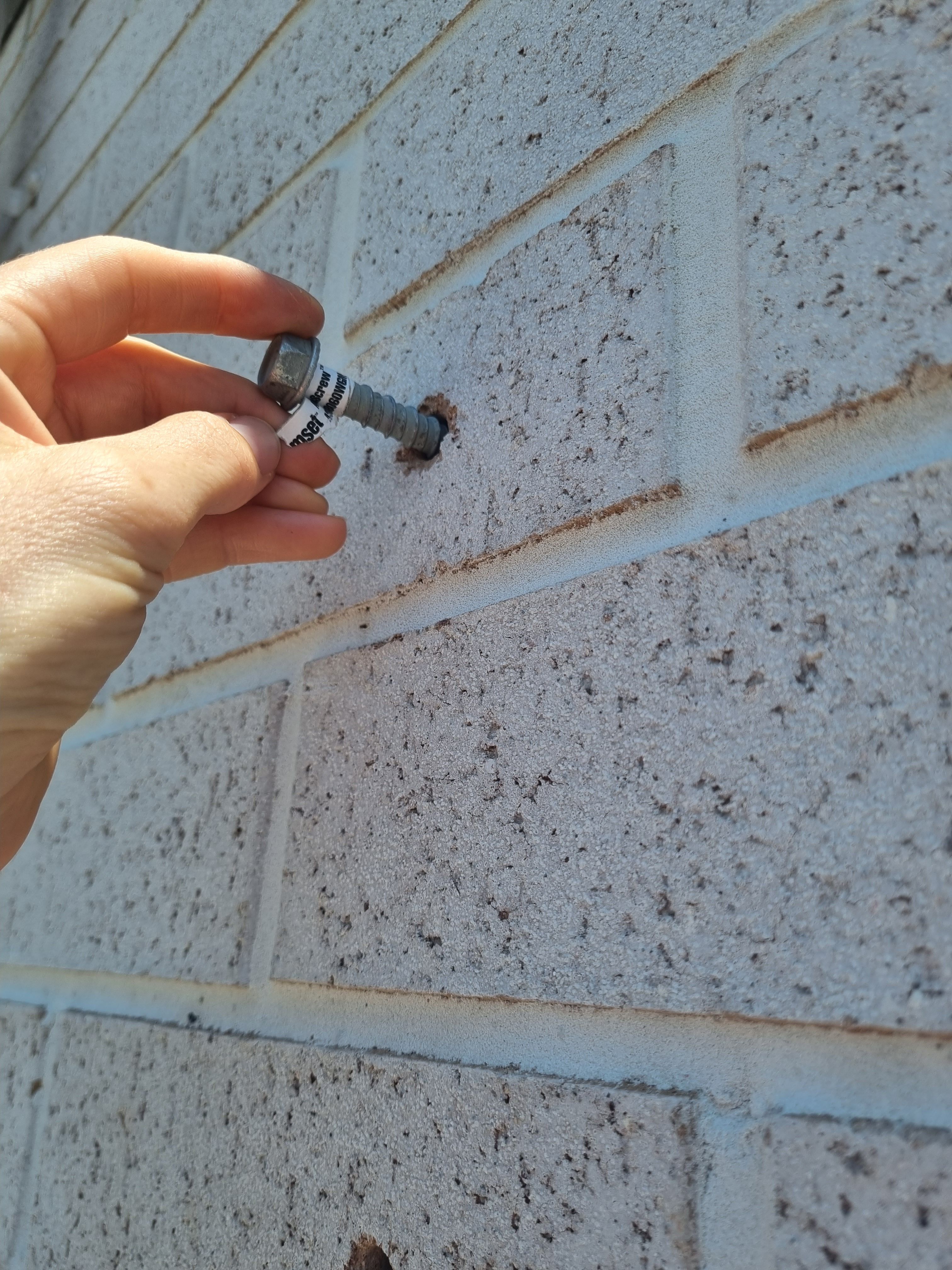 How to mount a clothesline into brick? Bunnings community