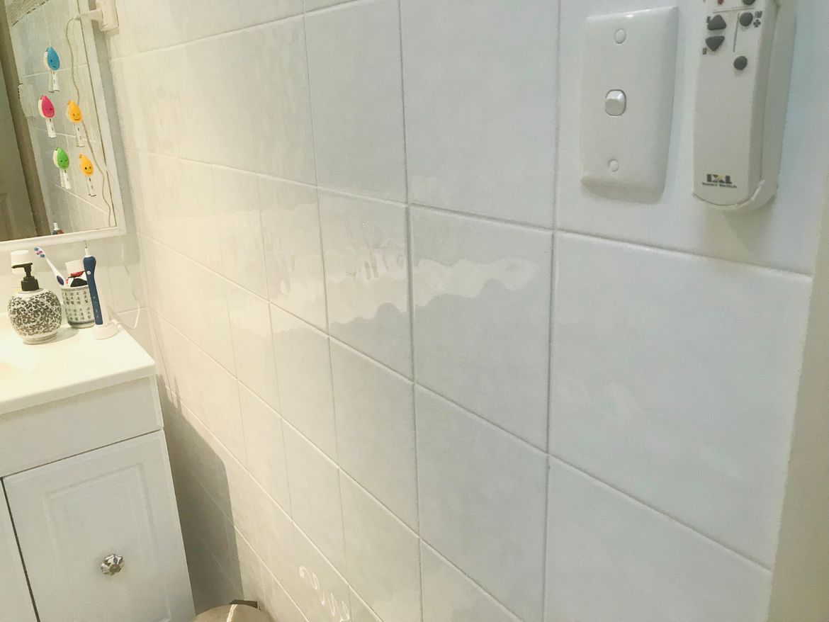 Replaced the towel rails, soap holders etc with a few spare tiles I had on hand (lucky!)