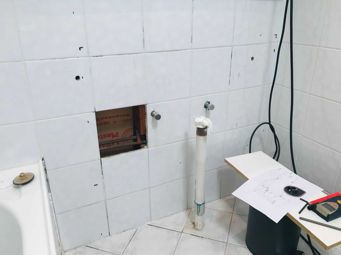 Had to remove the floor pipe and have it come out of the wall