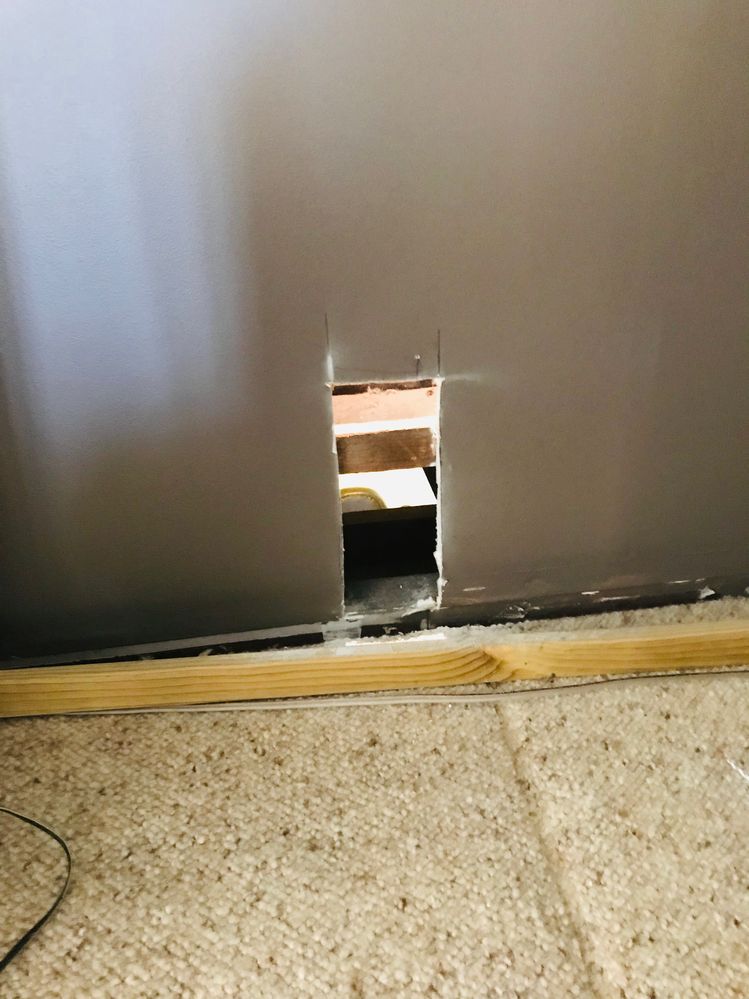 Had to cut out the wall in the opposite room to get to relocate the pipe