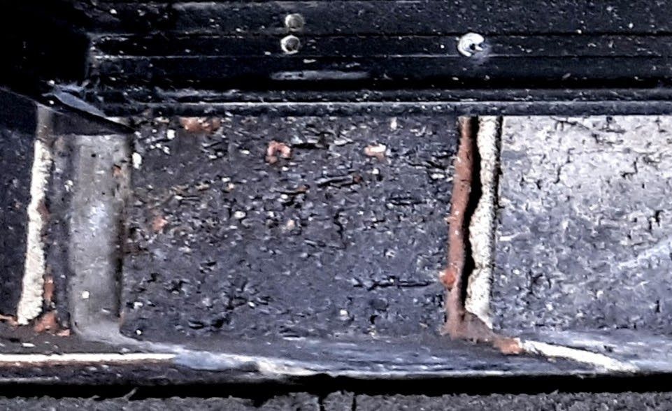 Bricks at bottom of glass stacker doors to step outside