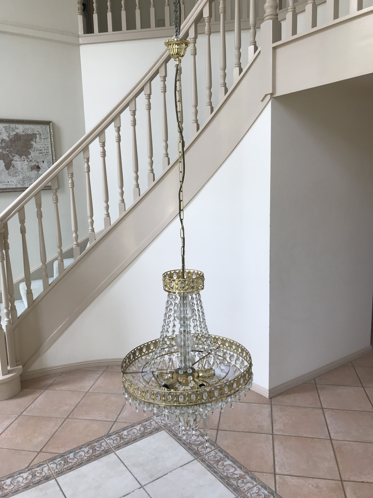 Chandelier lowered for maintenance