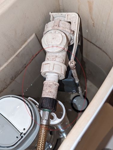 Water inlet valve propped up aganist new flush valve vent