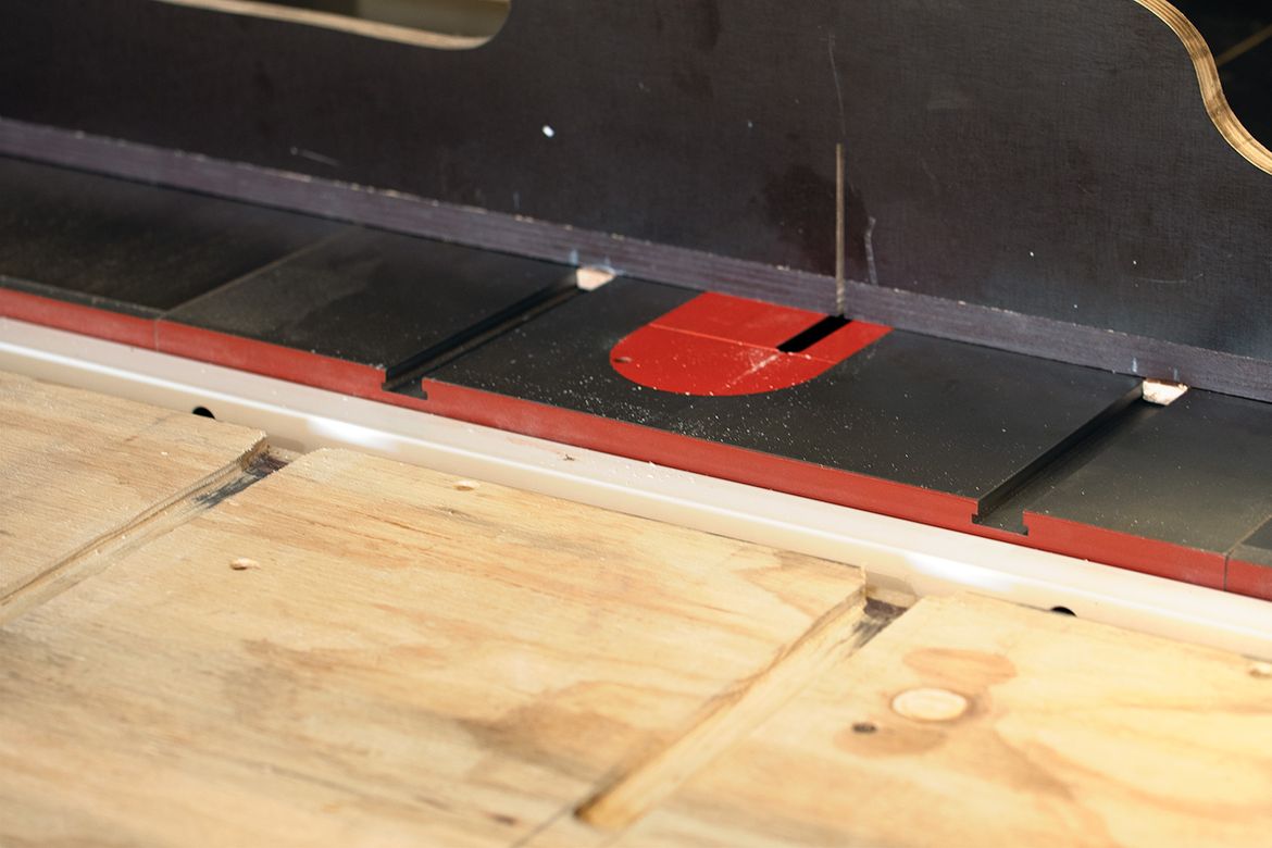 I routed out extensions of the saw's mitre slots so that the crosscut sled, or any others, could move forward with the outfeed table in place.