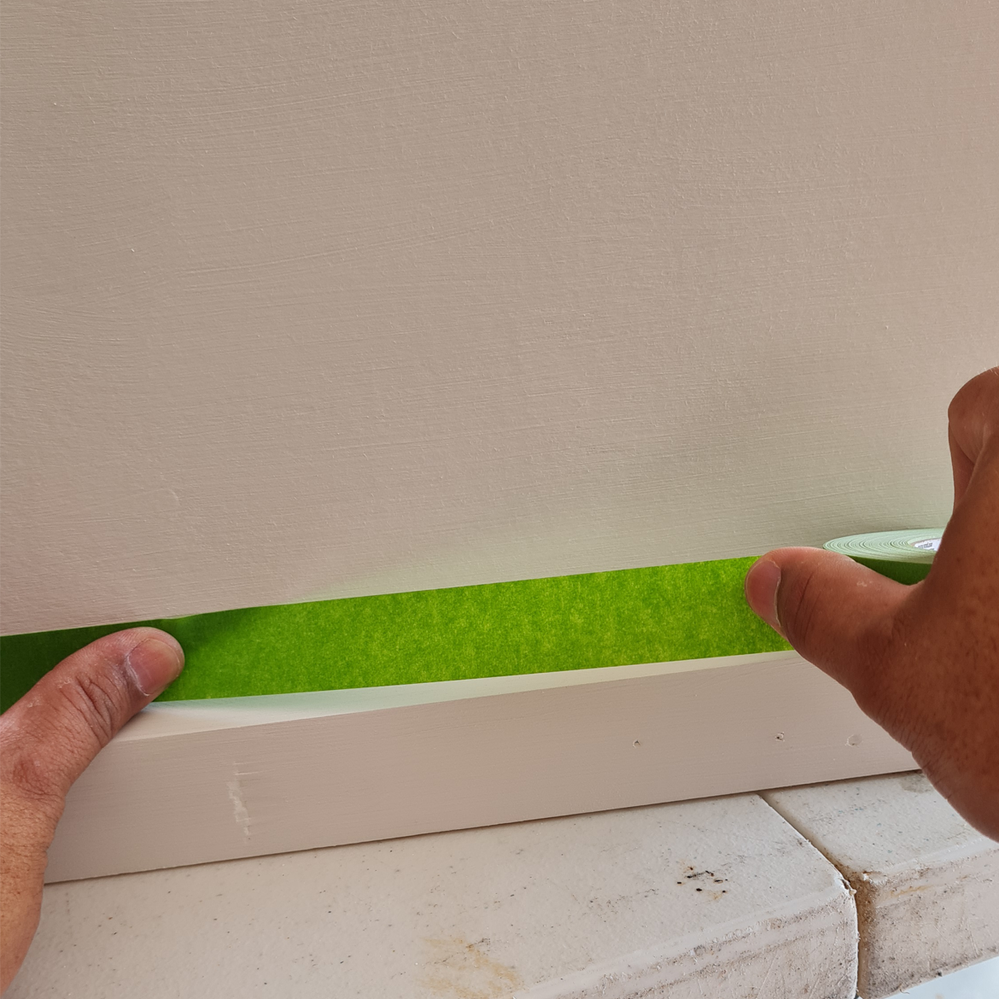 Step 2.5 Use thumbs to keep tape straight..png