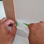 Step 2.3 Use putty knife to apply tape to corner..png