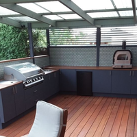 Outdoor kitchen with built-in barbecue