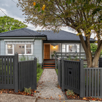 Weatherboard home renewed with paint
