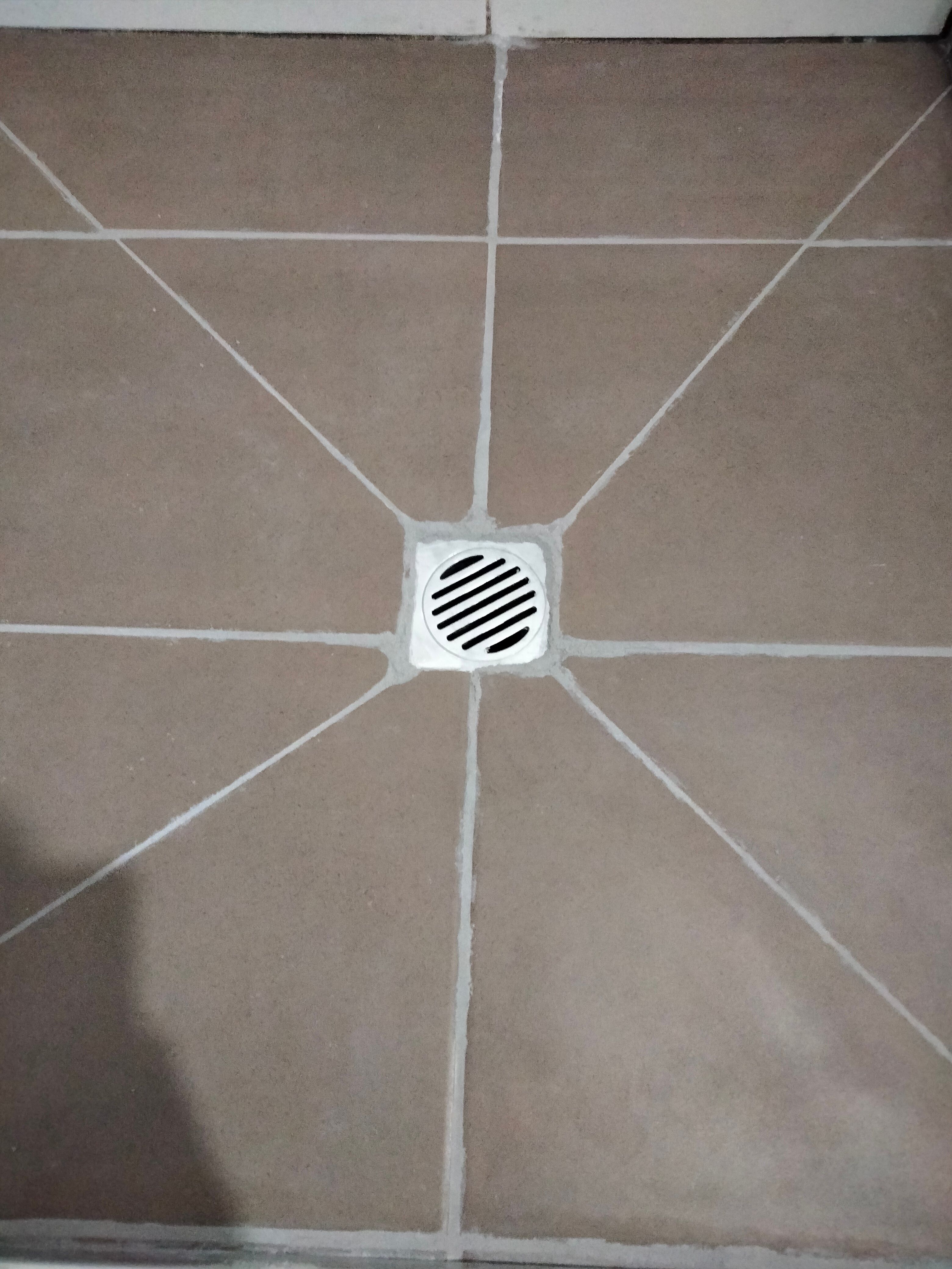 How to fix wet spots of new grout? Bunnings community