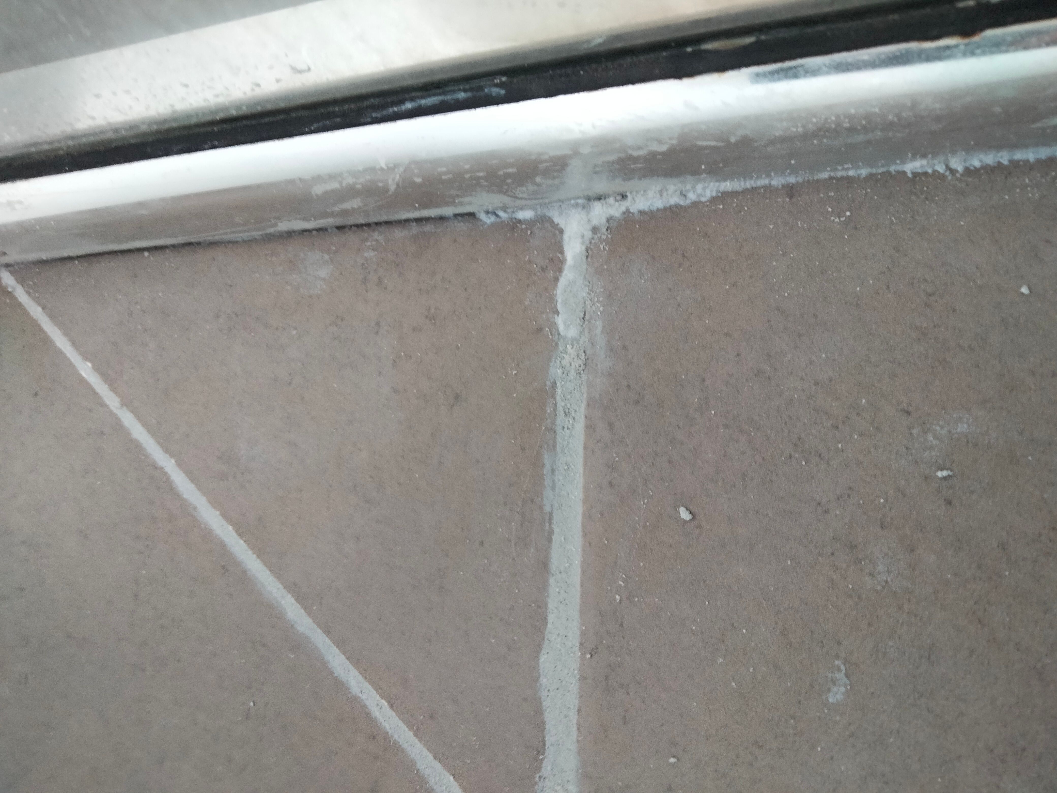 How to fix wet spots of new grout? Bunnings community