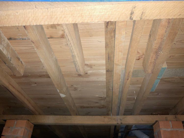 Joist overlapping into insulation space