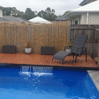 Low-level deck for pool area